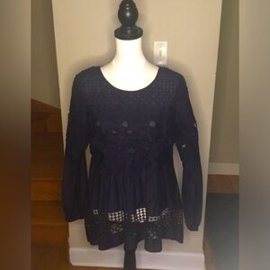 Blue long sleeve blouse with scoop neck and pleated embellished design